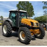 NEW HOLLAND TS135A TRACTOR, DIESEL, ENCLOSED CAB, 4WD , COLD AC, RUNS & OPERATES