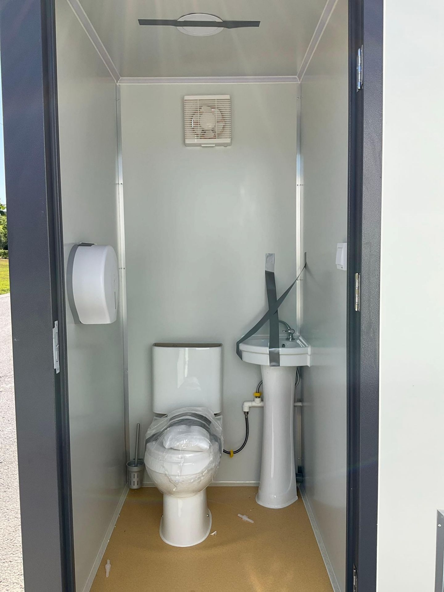 UNUSED PORTABLE DOUBLE BATHROOM UNIT, 2 STALLS, ELECTRIC & PLUMBING HOOK UP WITH EXTERIOR PLUMBIN... - Image 11 of 11