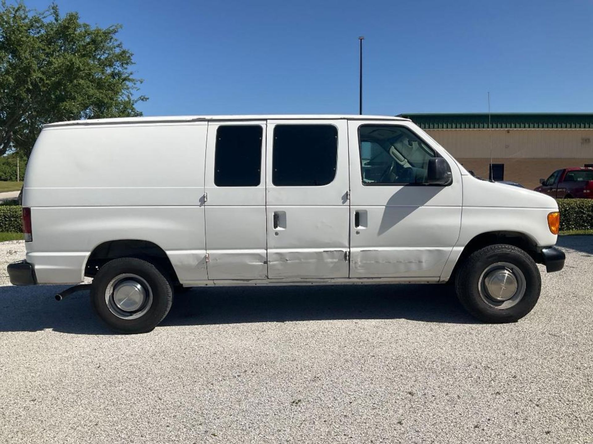 2003 FORD E-SERIES CARGO VAN, APPROX GVWR 8600LBS, STORAGE UNIT & SHELVES IN BACK , RUNS & DRIVES - Image 11 of 28