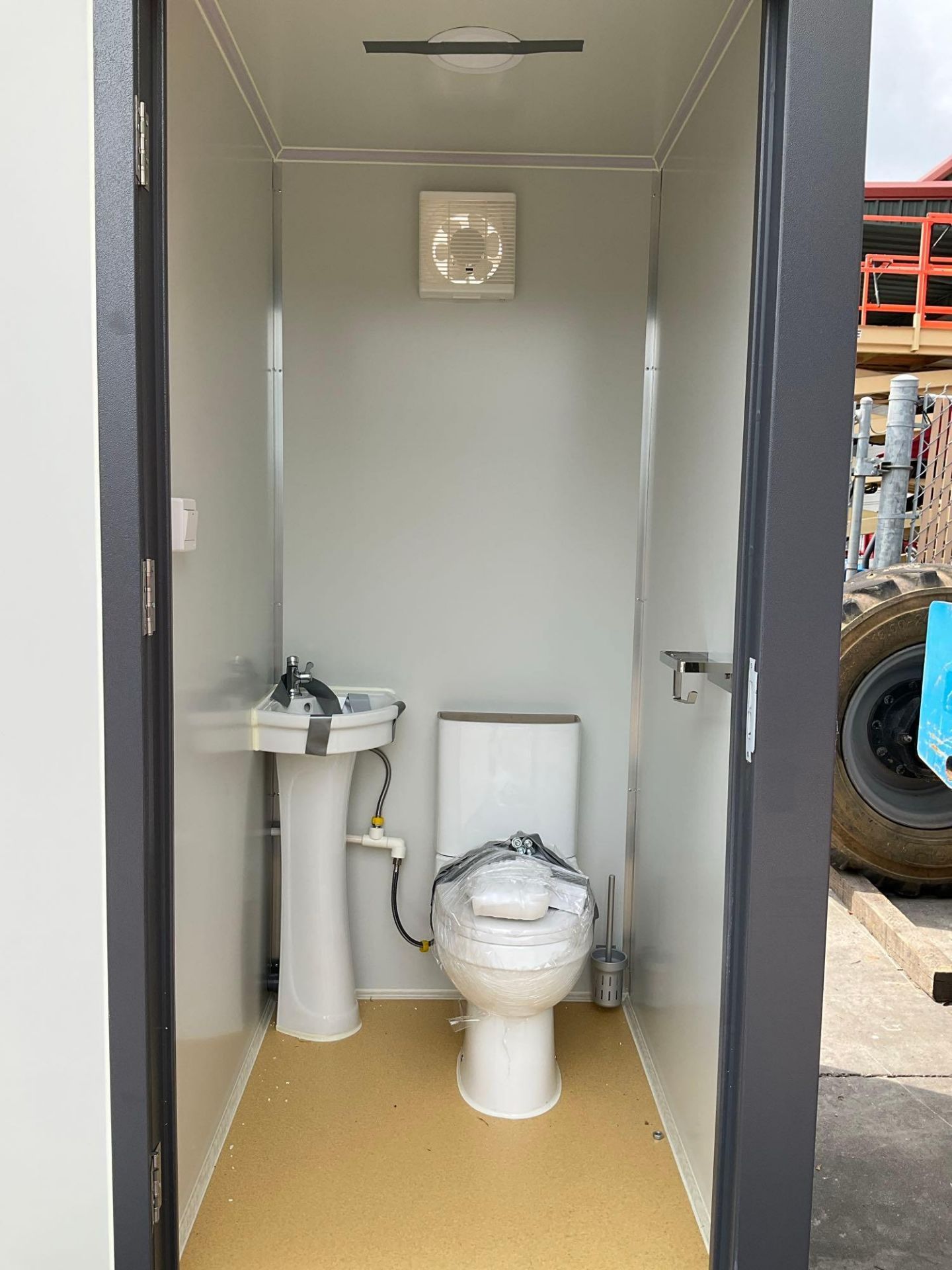 UNUSED PORTABLE DOUBLE BATHROOM UNIT, 2 STALLS, ELECTRIC & PLUMBING HOOK UP WITH EXTERIOR PLUMBING - Image 13 of 14