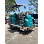 TENNANT RIDE ON SWEEPER MODEL S20, DIESEL,CONDITION UNKNOWN...