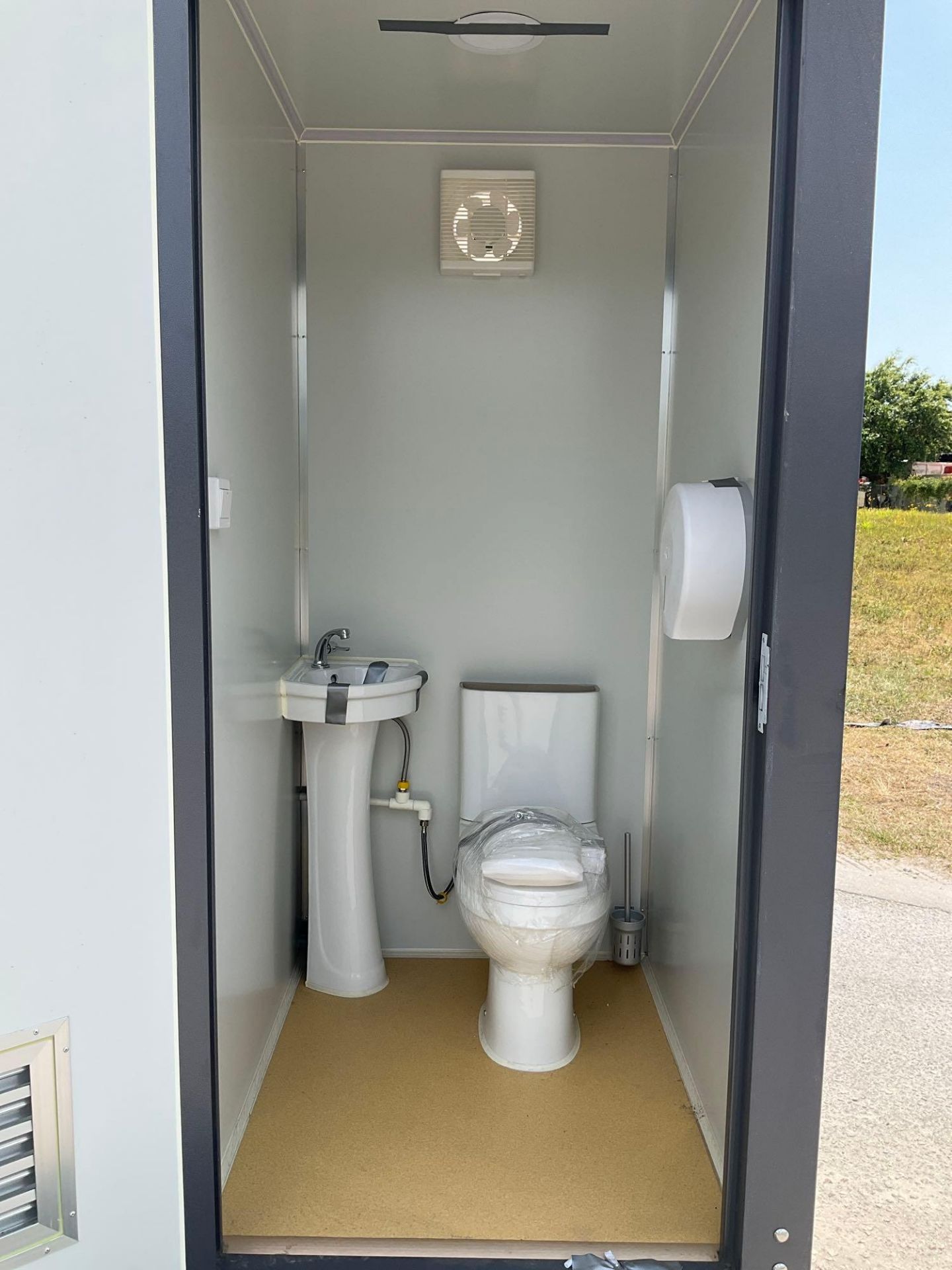UNUSED PORTABLE DOUBLE BATHROOM UNIT, 2 STALLS, ELECTRIC & PLUMBING HOOK UP WITH EXTERIOR PLUMBIN... - Image 12 of 12