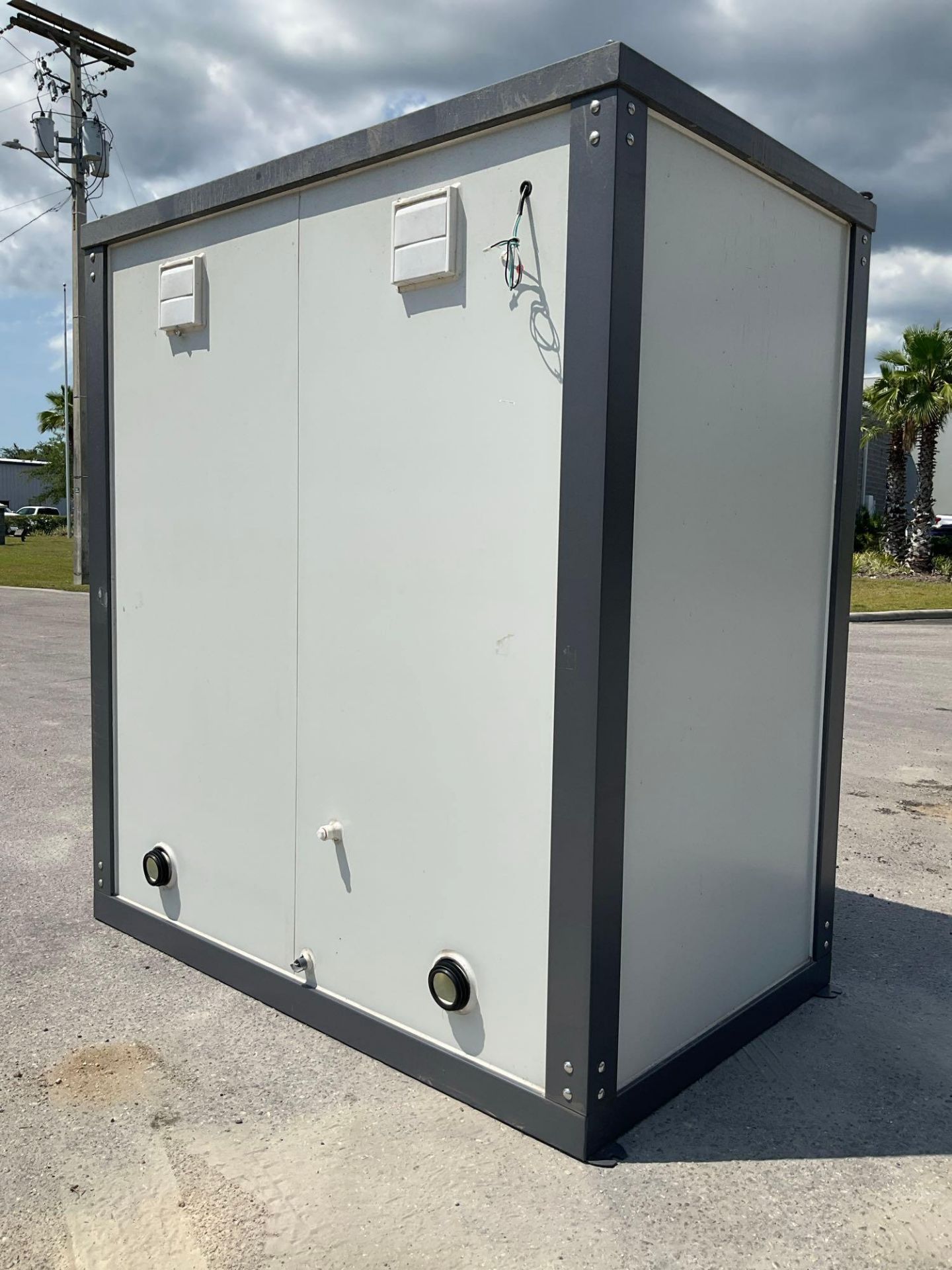 UNUSED PORTABLE DOUBLE BATHROOM UNIT, 2 STALLS, ELECTRIC & PLUMBING HOOK UP WITH EXTERIOR PLUMBIN... - Image 2 of 12