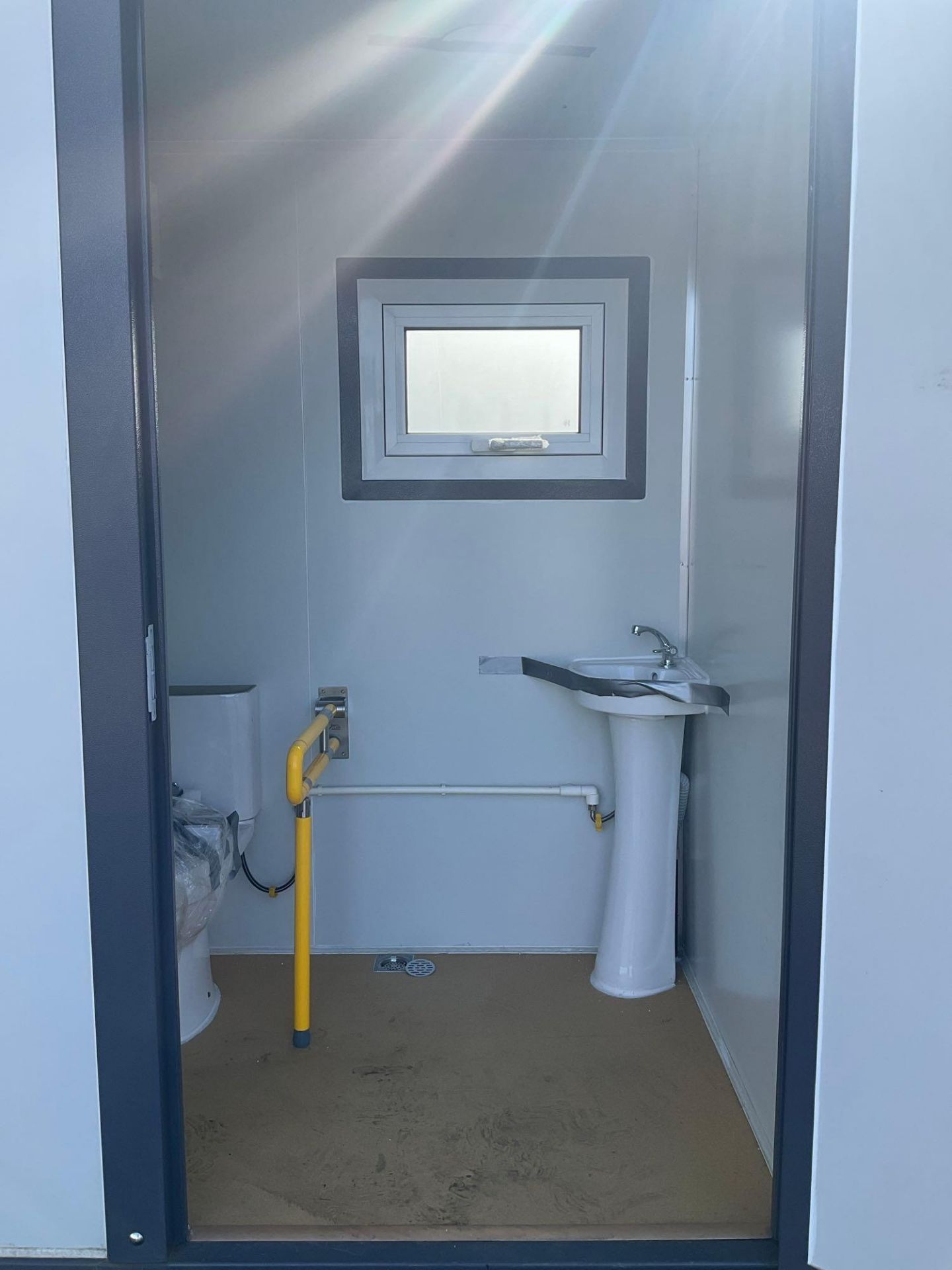 UNUSED PORTABLE BATHROOM UNIT WITH RAMP/HANDICAP ACCESSIBLE, ELECTRIC & PLUMBING HOOK UP WITH EX - Image 9 of 12