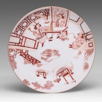 A Chinese iron-red 'Barbarians in the Treasure Chamber' dish, with a Daoguang mark, dia 20,5 cm