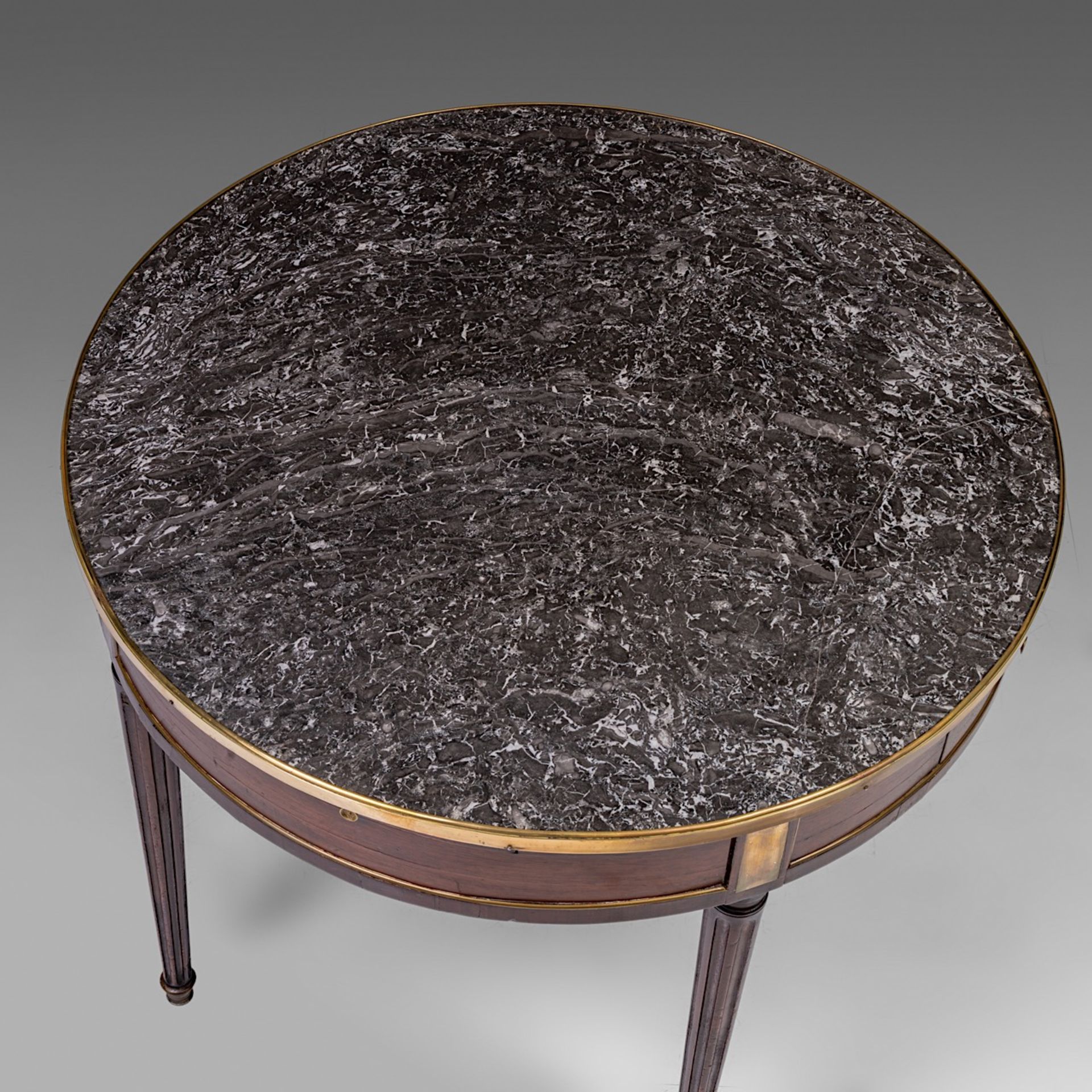 A Louis XVI bouillotte table with a marble top and gilded bronze mounts, H 73 - dia 85 cm - Image 6 of 8