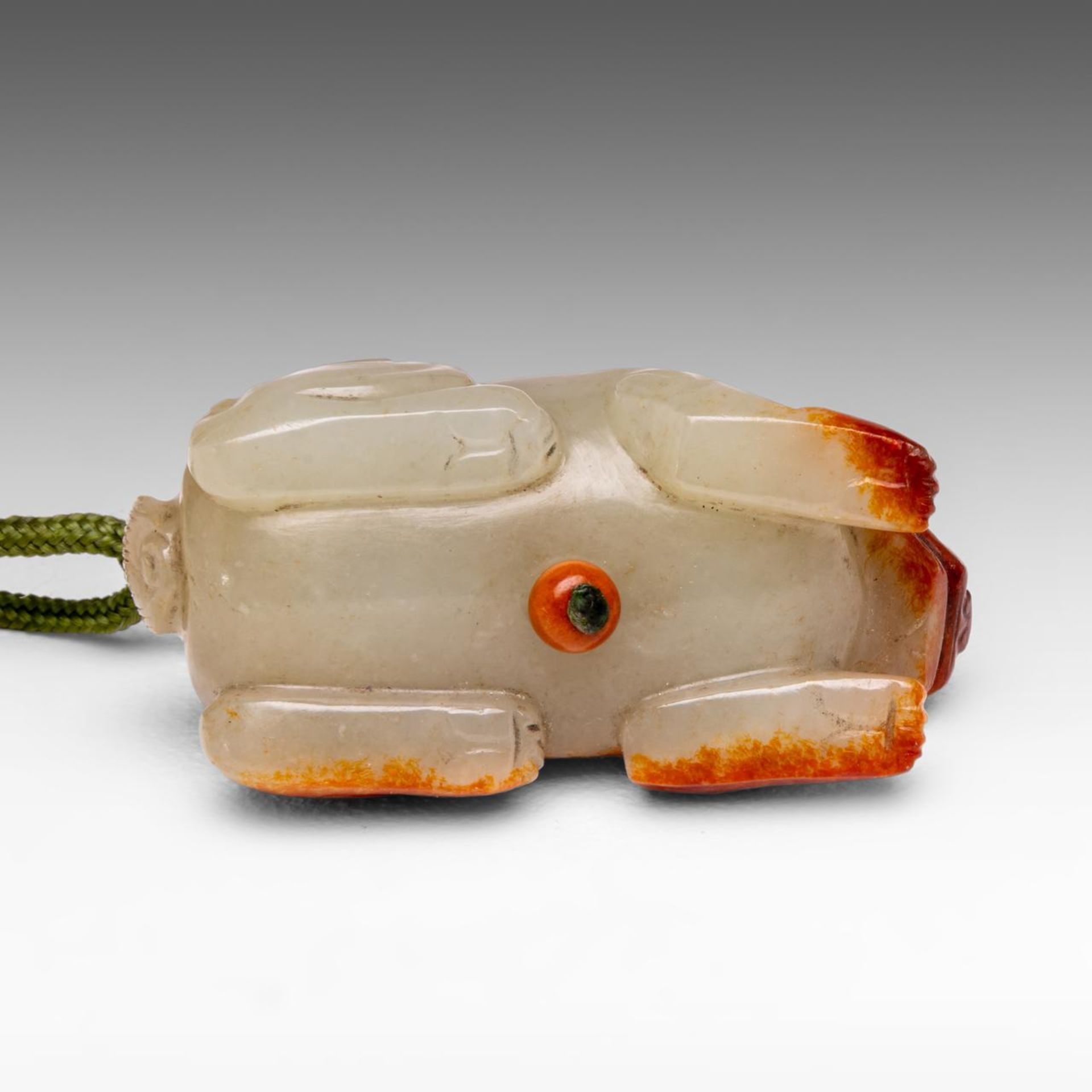 A Chinese russet jade carving of a mythical beast, Ming dynasty, L 5,4 cm - Image 7 of 8