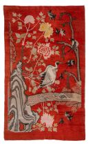 A Chinese woollen rug decorated with a crane bird and swallows, 19thC, 141 x 235 cm