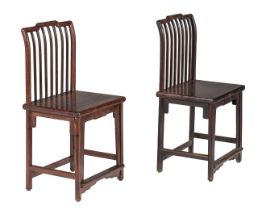 A pair of Chinese hardwood spindle back chairs, Republic period, H 92 - W 52,5 - D 40 cm
