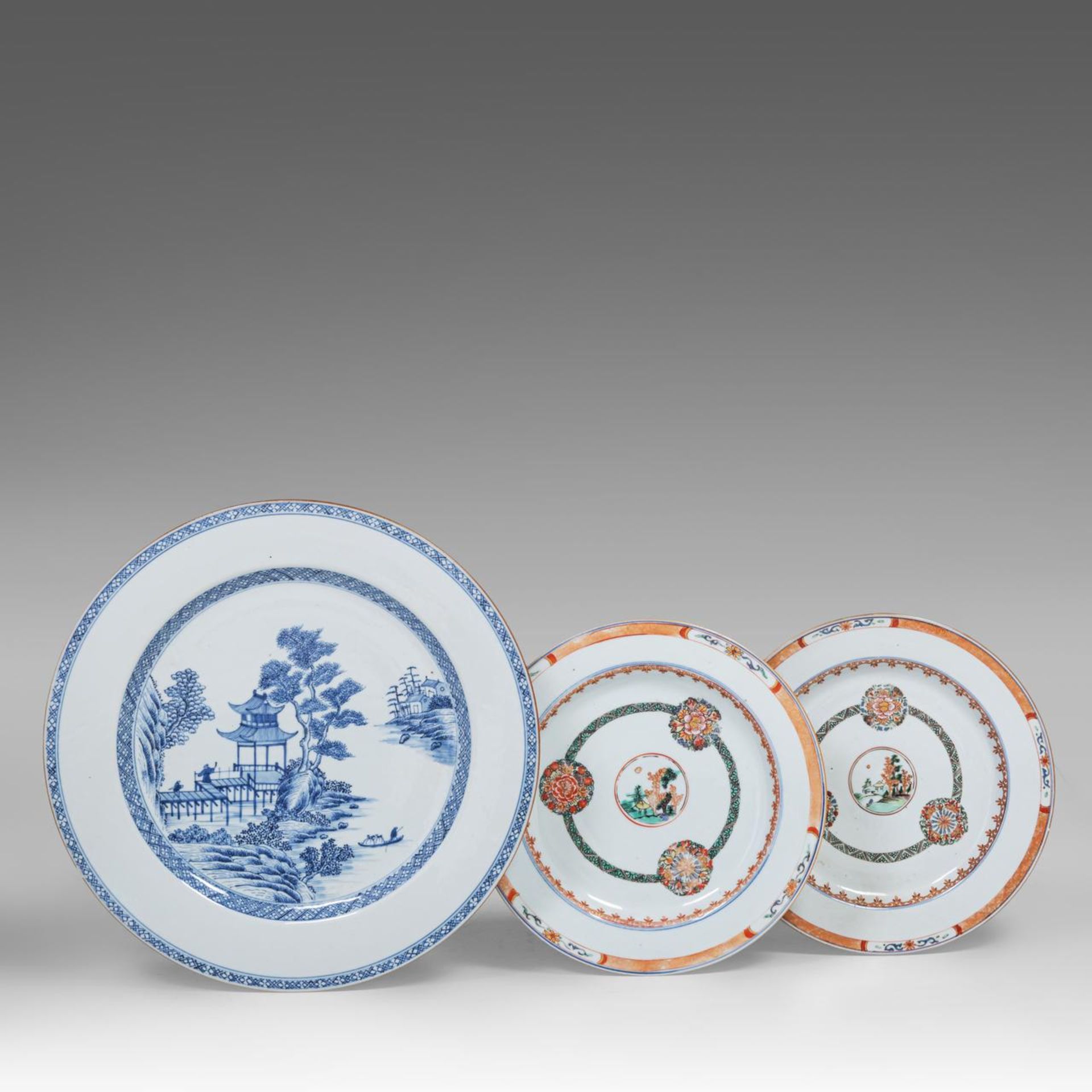 A Chinese blue and white 'Figures and pavilions in a riverscape' large plate, 18thC, dia 39 cm - add