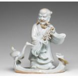 A Chinese blanc-de-Chine group of an Immortal and a crane, 18thC, H 21,8 cm