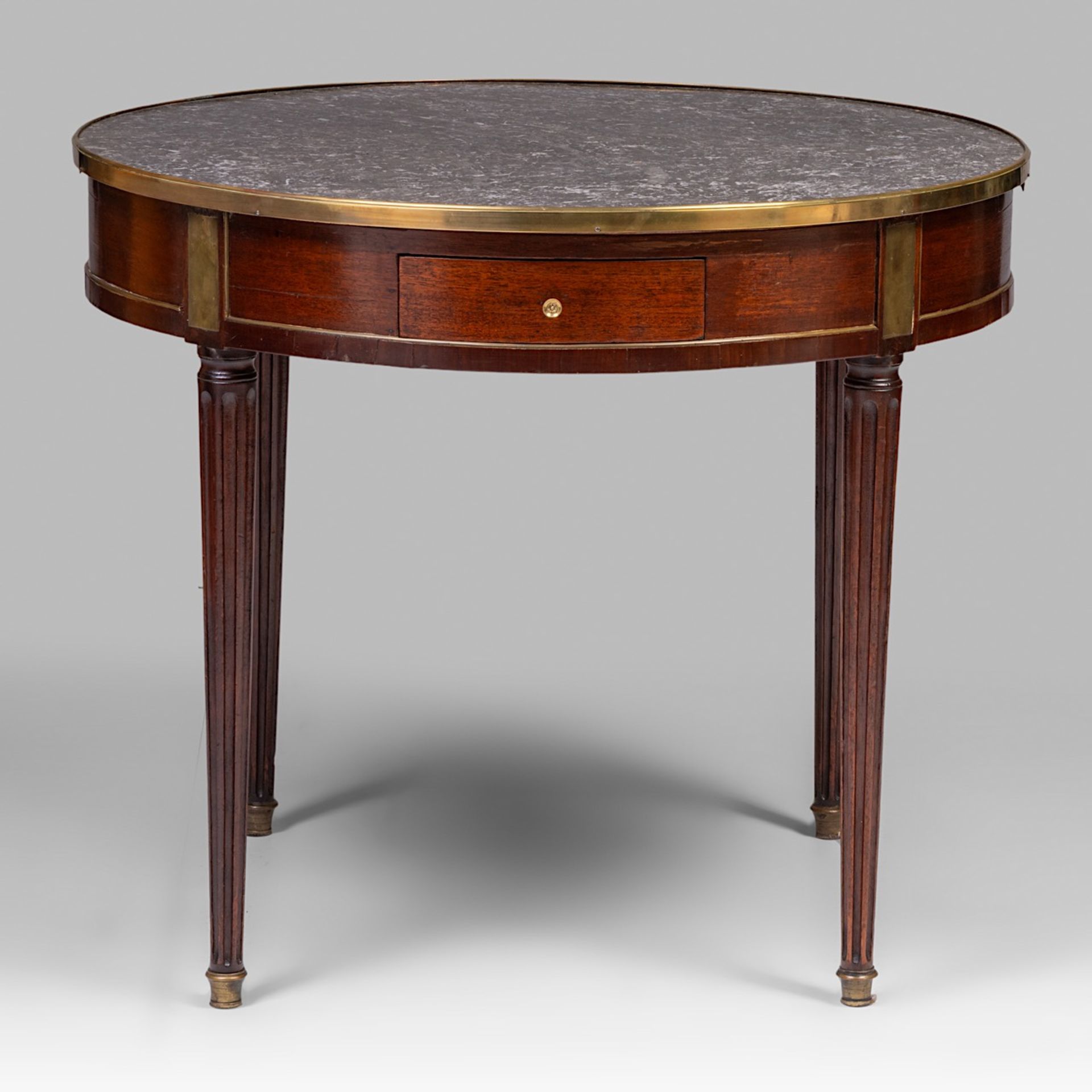 A Louis XVI bouillotte table with a marble top and gilded bronze mounts, H 73 - dia 85 cm - Image 2 of 8