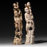 Two Japanese late Meiji period walrus ivory okimono, H 27,8 - 28,2 cm / weight 630 - 513 g.