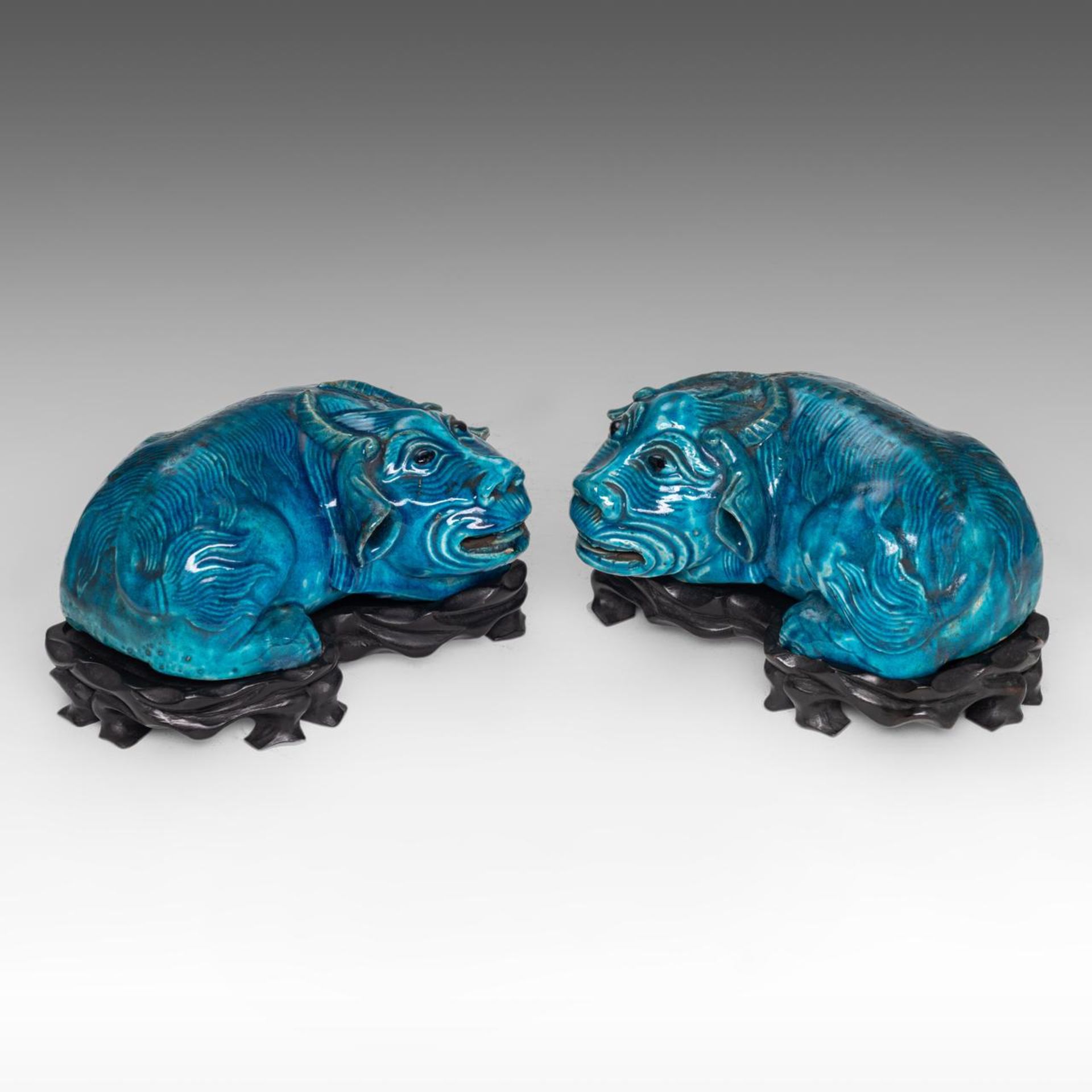 A pair of Chinese turquoise glazed ceramic figures of a recumbent water buffalo, mid-late Qing, L 20 - Image 2 of 8