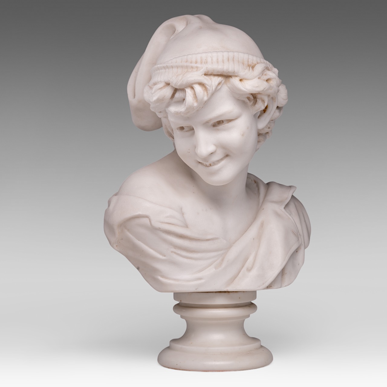 After Jean-Baptiste Carpeaux (1827-1875), 'Le Rieur Napolitian', Carrara marble bust, H 49 cm