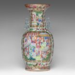 A fine Chinese Canton famille rose 'Court scenes' vase, paired with stylised dragon handles, Daoguan