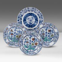 Three Chinese doucai 'Flower garden' dishes and a blue and white plate, Kangxi period, dia 22,5 - 25