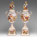 A pair of Saxony porcelain urns, with hand-painted roundels and flower relief decoration, marked Aug