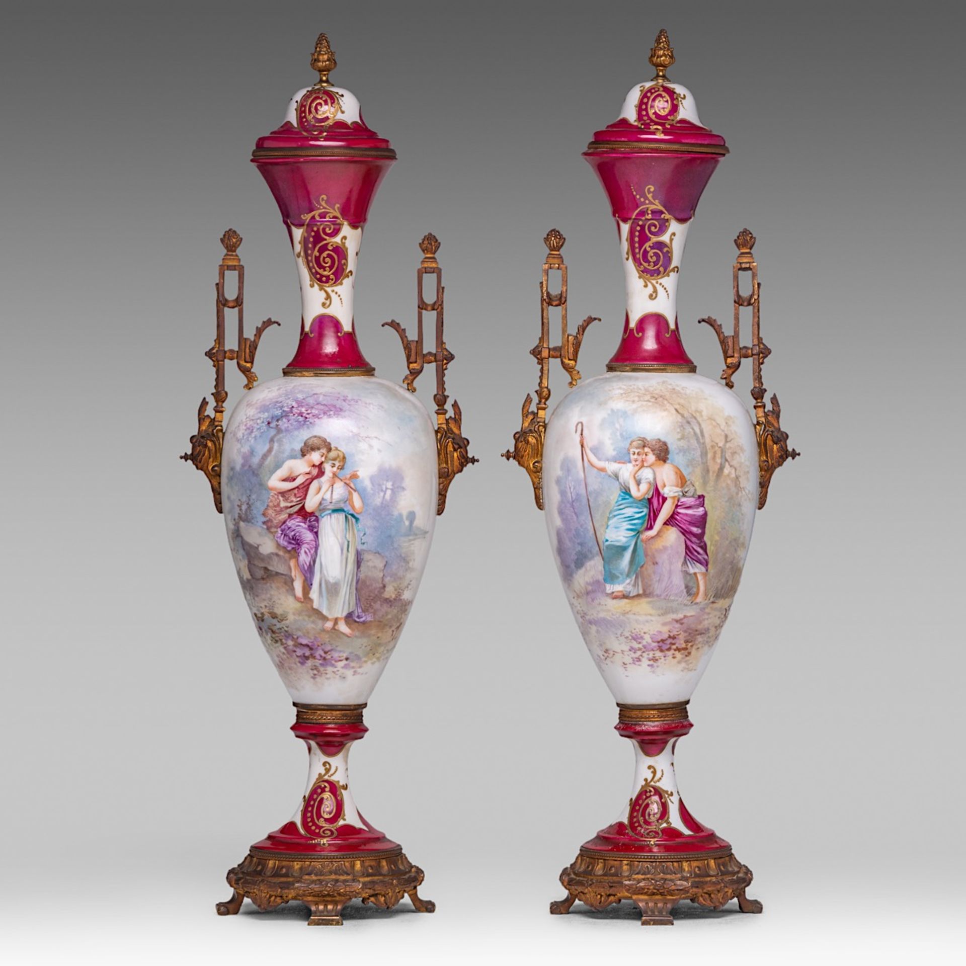 A pair of Sevres porcelain Neoclassical vases, with hand-painted romantic scenes, H 69 cm