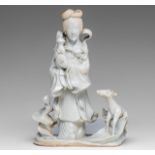 A fine Chinese blanc-de-chine group of a female Immortal and a deer, 18thC, H 25 cm