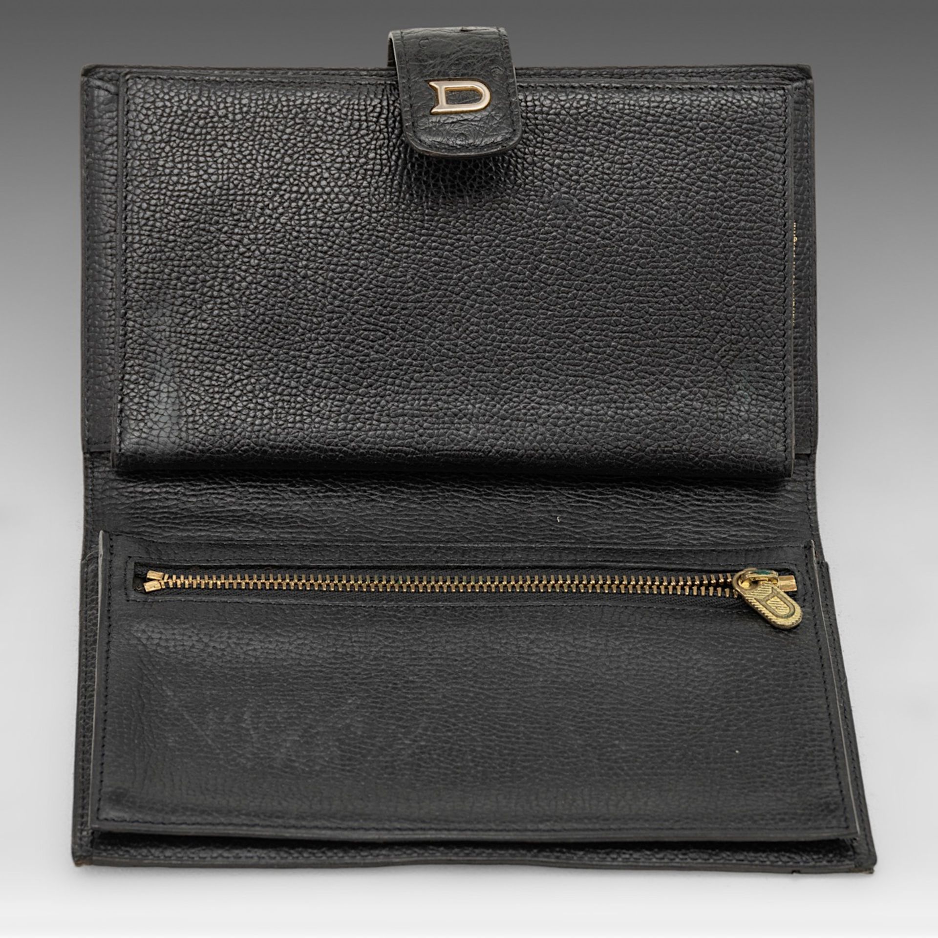 A matching collection of a Delvaux shoulder bag, a clutch and a wallet in black ostrich leather. - Image 15 of 16
