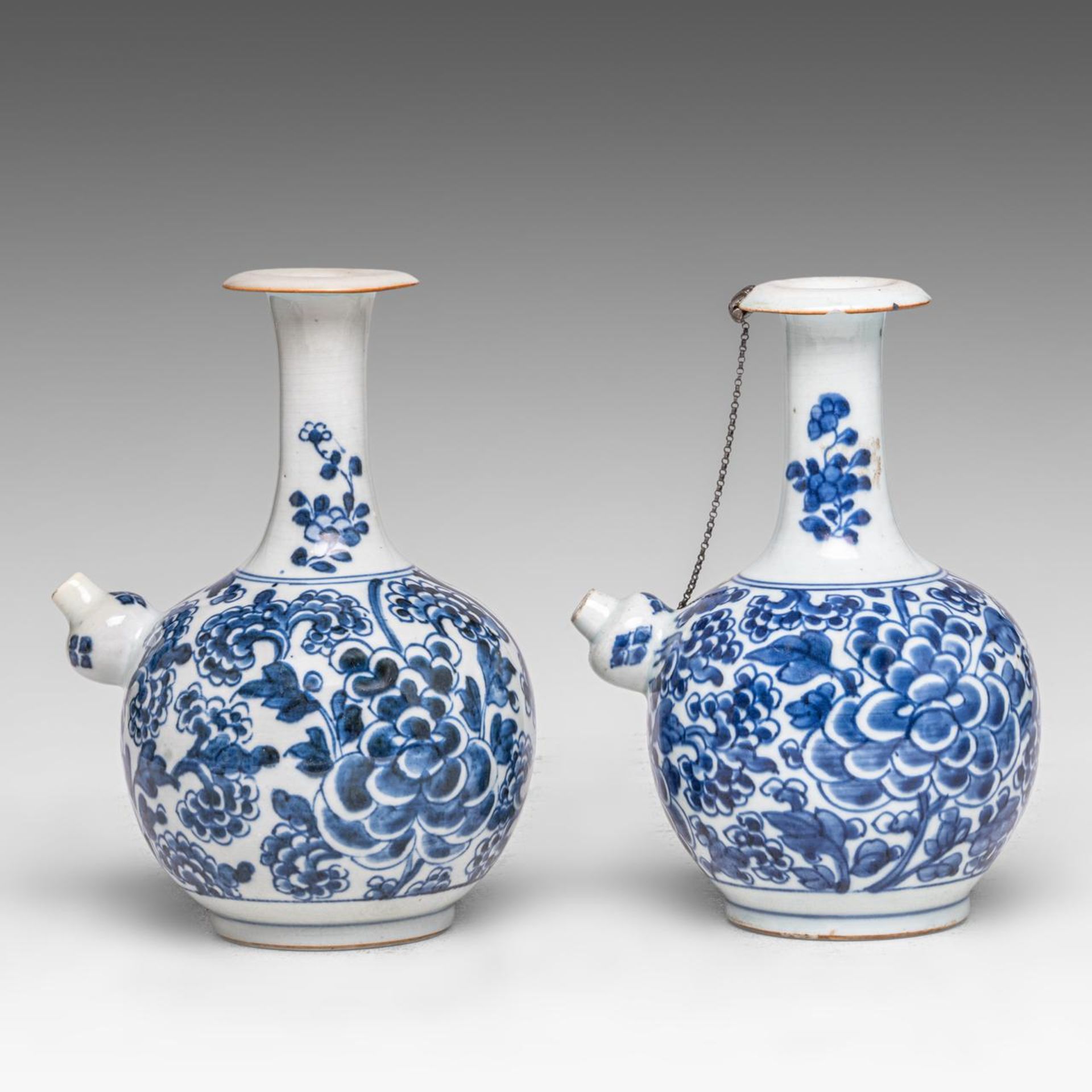 Two Chinese 'Peony scrolls' kendi jugs, Transitional/ Kangxi period, H 20 cm - Image 2 of 7