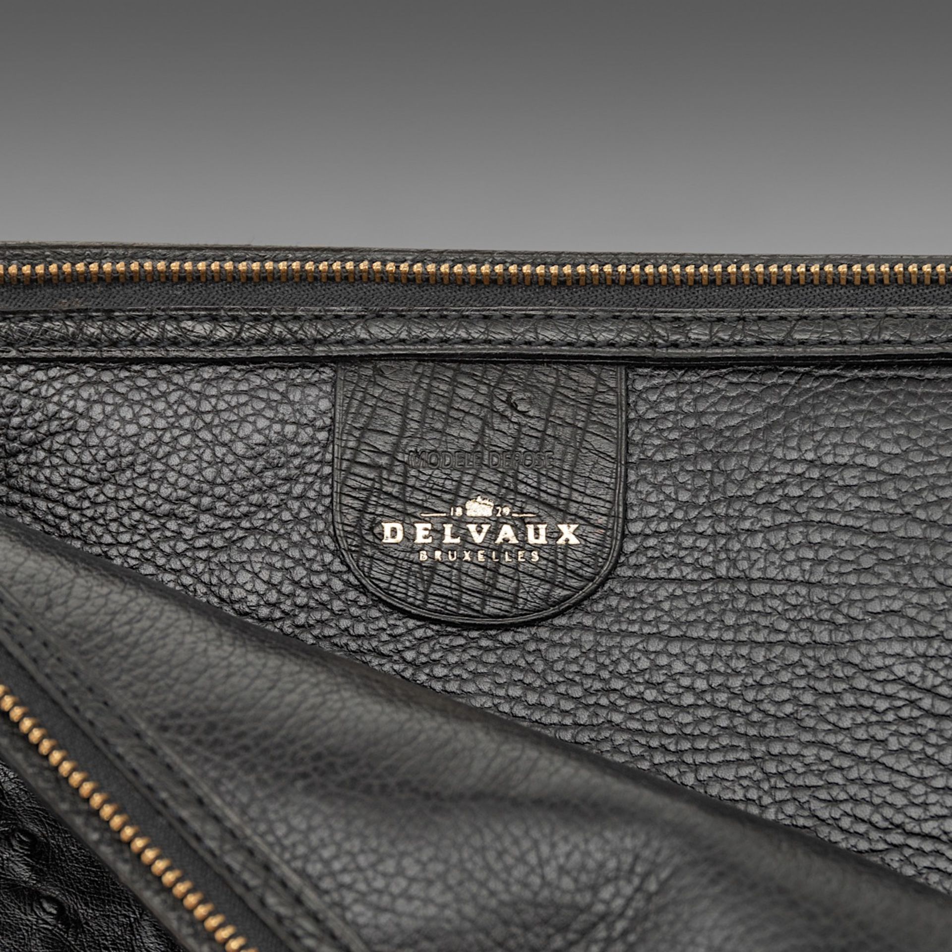 A matching collection of a Delvaux shoulder bag, a clutch and a wallet in black ostrich leather. - Image 10 of 16