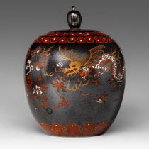 A Japanese-style mirror-black glazed melon-shaped 'Dragon' jar, 20thC, H 26 cm