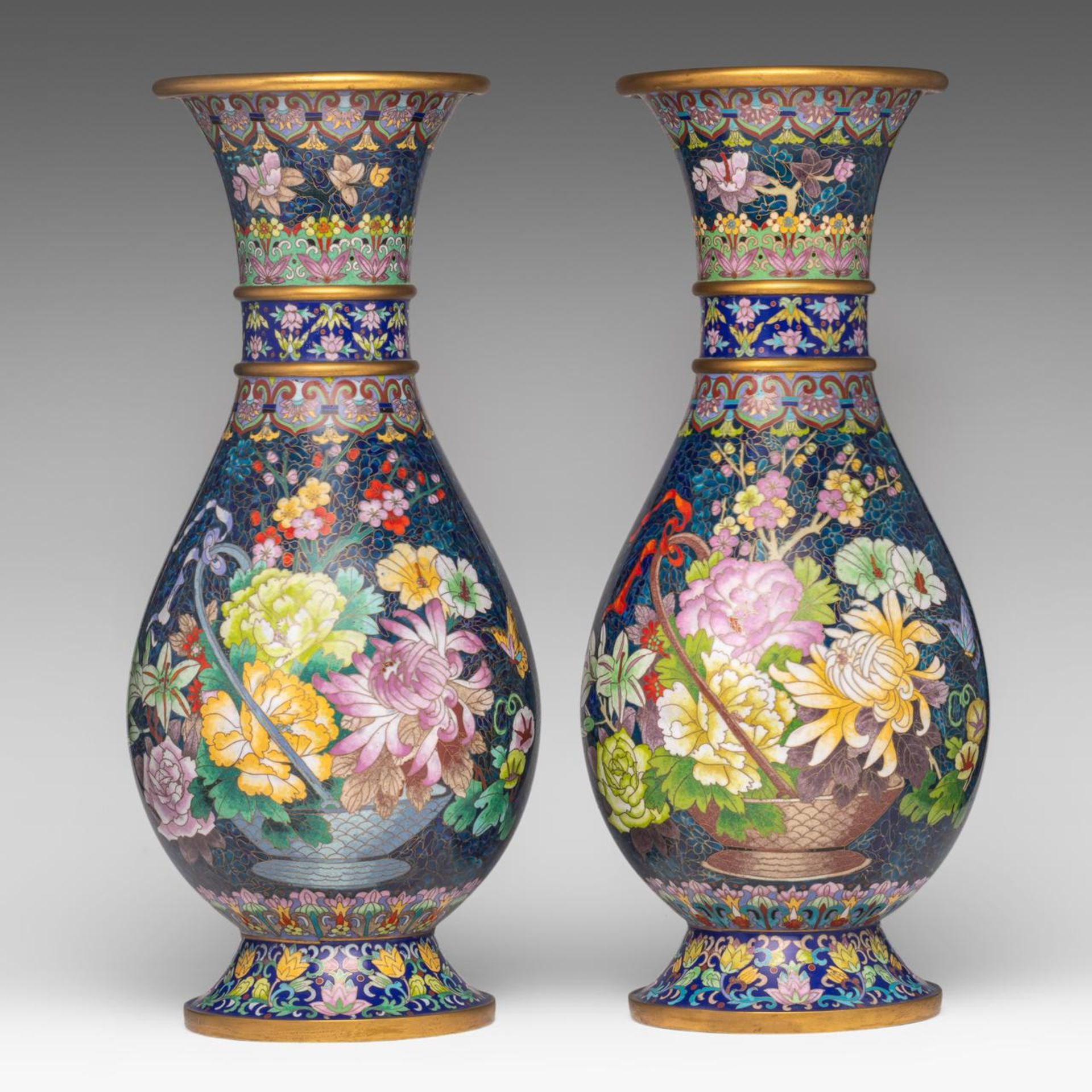 A pair of Chinese cloisonne enamelled 'Flower basket' vases, 20thC, H 52,5 cm