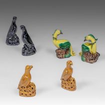 A small collection of enamelled biscuit figures of parrots and phoenixes, 18thC, tallest H 25,7 cm