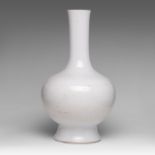 An impressive Chinese white porcelain bottle vase, Ming or later, H 57 cm