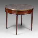 A Louis XVI bouillotte table with a marble top and gilded bronze mounts, H 73 - dia 85 cm