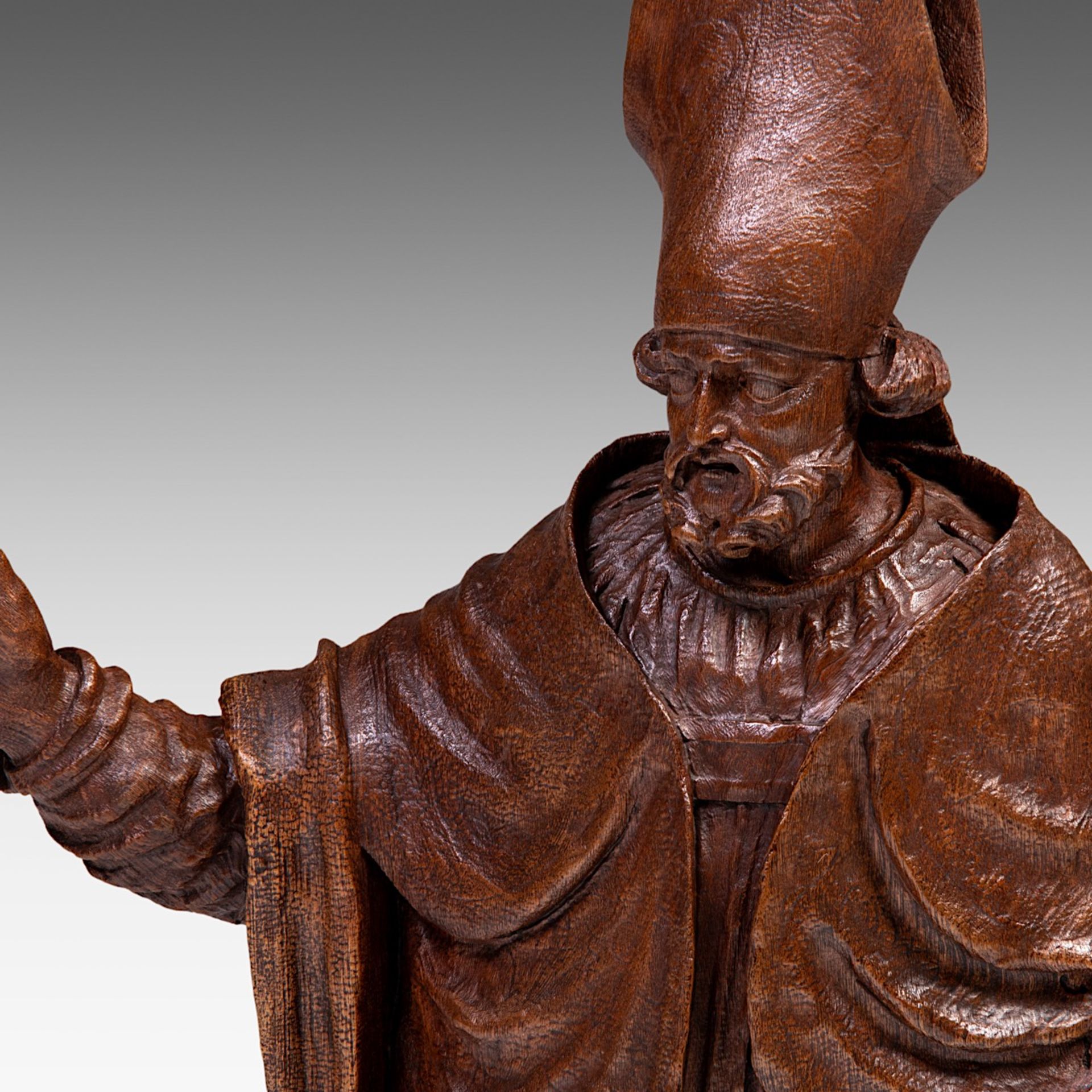 An 18thC carved oak sculpture of a bishop making his blessing, H 110 cm - Image 6 of 6