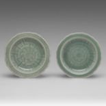 A pair of Chinese incised celadon ware 'Lotus' plates, 19thC, dia 12,7 cm