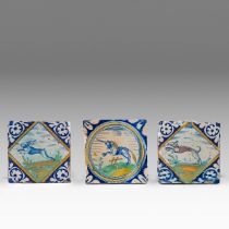 Three Dutch Delft maiolica tiles: a unicorn, a hare and a dog, early 17thC, 13,5 x 13,5 / 13 x 13 cm