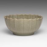 A large Chinese carved Longquan celadon bracket-lobed rim bowl, Ming dynasty, dia 31,5 - H 15 cm