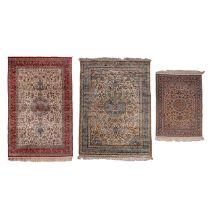 A set of three Oriental rugs, floral decorated with central medallions, 126,5 x 184 / 184 x 274,5 /