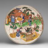 A Japanese polychrome on crackle glazed 'Rice farming' plate, small impress mark, 20thC, dia 26,5 cm