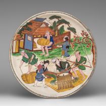 A Japanese polychrome on crackle glazed 'Rice farming' plate, small impress mark, 20thC, dia 26,5 cm
