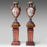 An imposing pair of Sevres baluster vases decorated with gallant garden scenes, signed Grisard, late