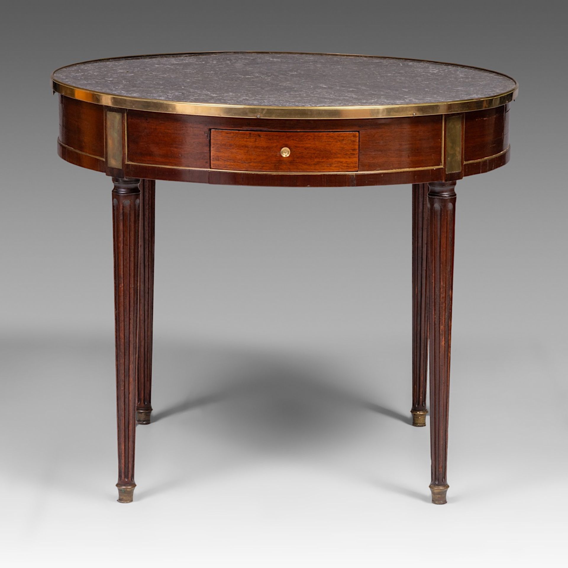 A Louis XVI bouillotte table with a marble top and gilded bronze mounts, H 73 - dia 85 cm - Image 4 of 8