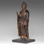 A Japanese polychrome and gilt lacquered figure of standing Buddha, presumably Edo period, H 34,5 cm