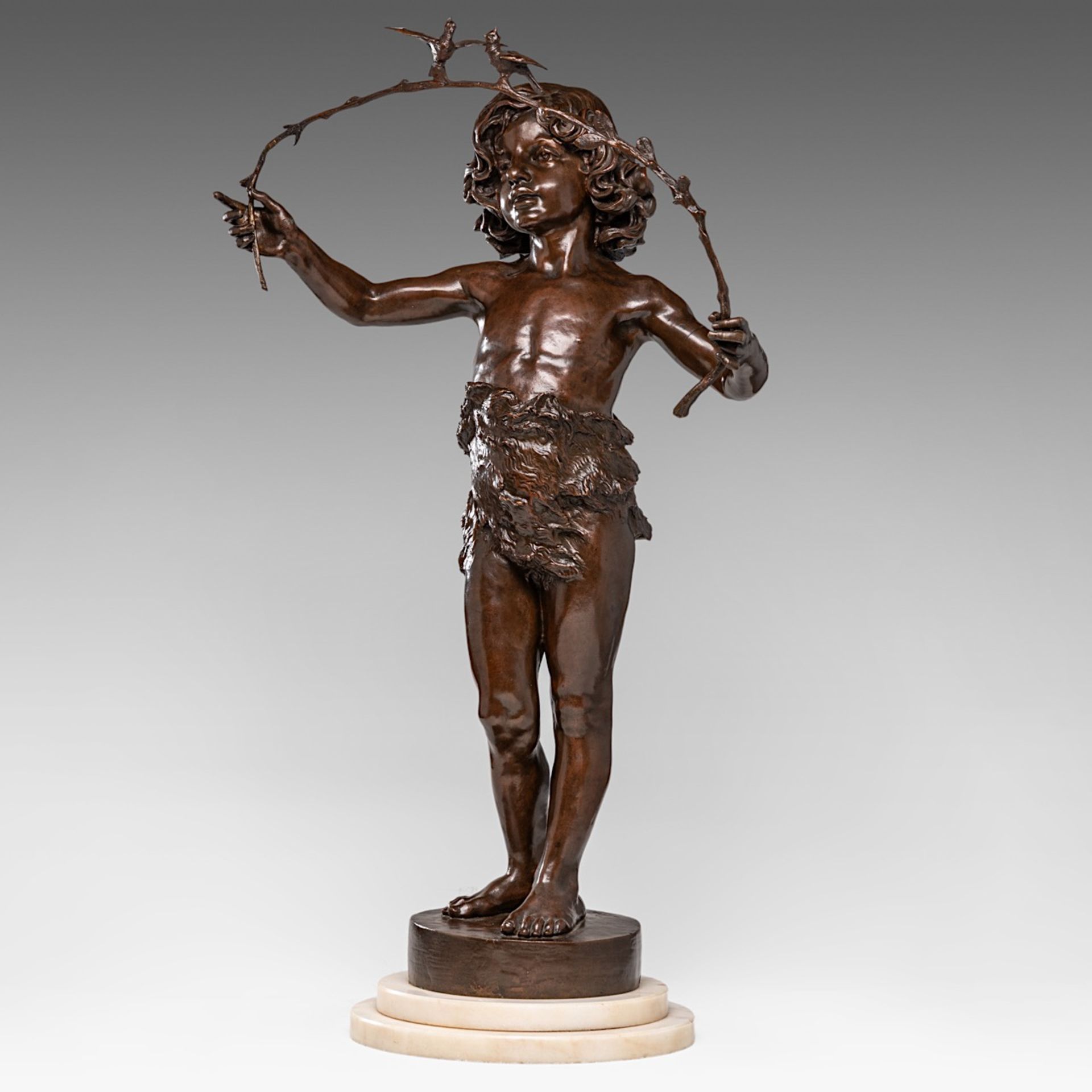 Marcel Debut (1865-1933), boy playing with birds, patinated bronze, H 70 cm