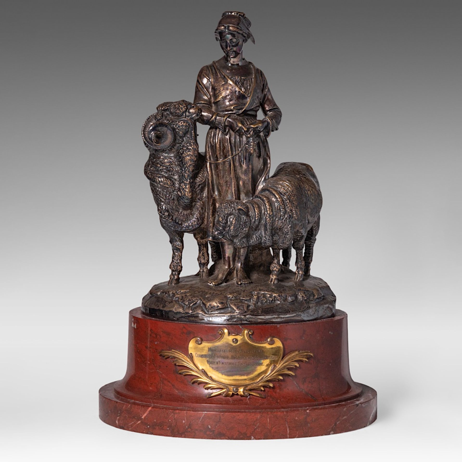 A silver-plated bronze group of a shepherdess with her sheep, cast by Christofle & Cie, 1885, H 41 c