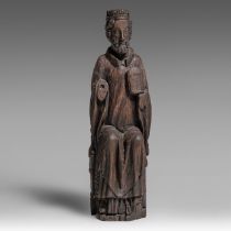 An oak sculpture of a seated and crowned saint, probably 14th/15thC, H 83 cm