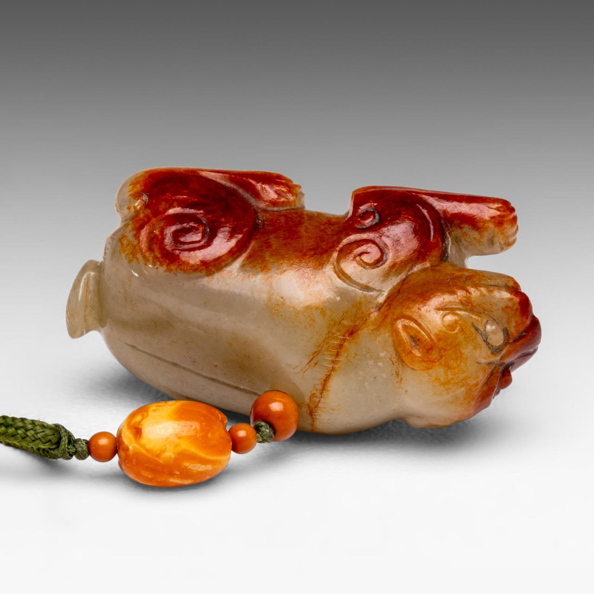 A Chinese russet jade carving of a mythical beast, Ming dynasty, L 5,4 cm - Image 8 of 8