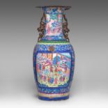 A rare imposing Chinese Canton enamel 'Court scenes' vase, paired with lion handles, Daoguang period