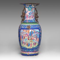 A rare imposing Chinese Canton enamel 'Court scenes' vase, paired with lion handles, Daoguang period