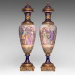 A pair of blue royale ground oblong Sevres type vases with hand-painted gallant scenes and gilt bron