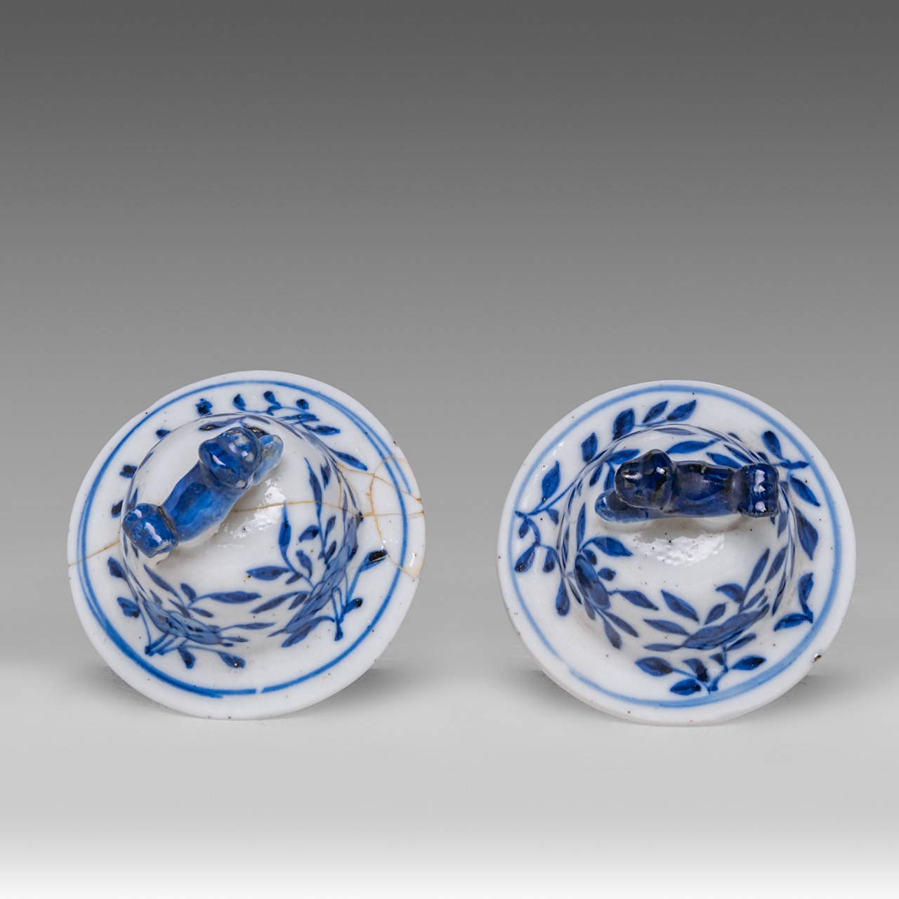 A near pair of Chinese blue and white 'Li Tieguai' lidded vases, with a Kangxi mark, 19thC, Total H - Image 7 of 8